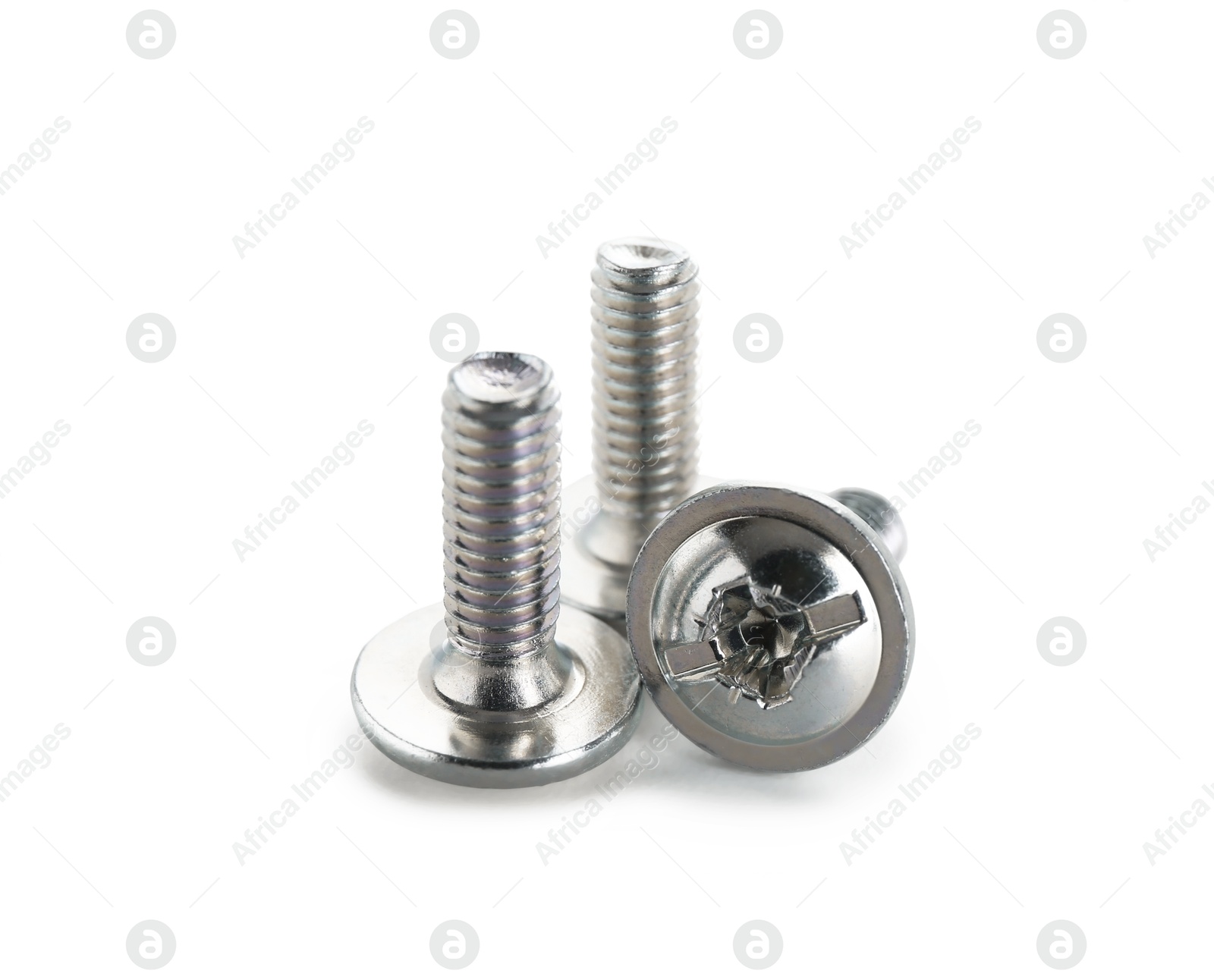Three metal bolts isolated on white. Hardware tool Photo of Three metal bolts isolated on white. Hardware tool