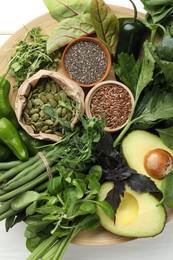 Photo of Superfood. Healthy food products on white table, top view