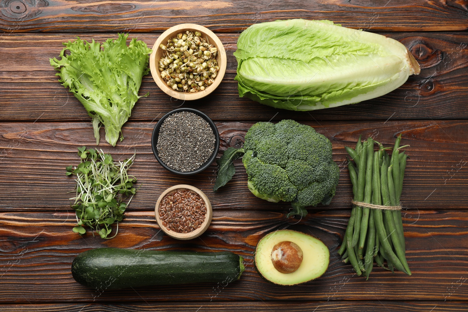 Superfood. Healthy food products on wooden table, flat lay Photo of Superfood. Healthy food products on wooden table, flat lay
