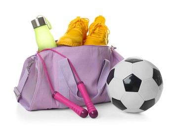 Photo of Stylish gym bag with sports equipment, bottle and sneakers isolated on white