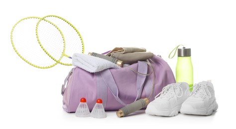 Photo of Stylish gym bag with sports equipment, bottle and sneakers isolated on white