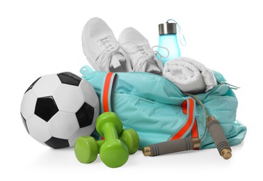 Photo of Stylish gym bag with sports equipment, towel, bottle and sneakers isolated on white