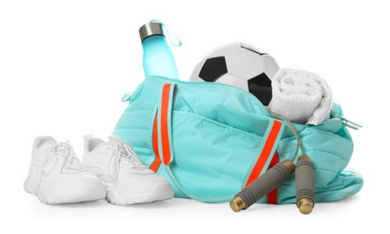 Photo of Stylish gym bag with sports equipment, towel, bottle and sneakers isolated on white