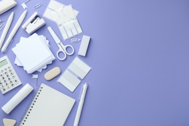 Photo of Different white stationery on violet background, flat lay. Space for text