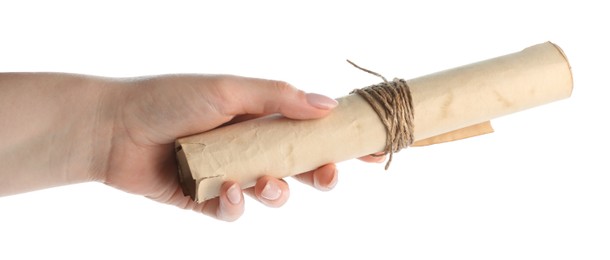 Photo of Woman holding old rolled scroll on white background, closeup
