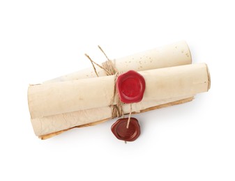 Photo of Old rolled paper scrolls isolated on white