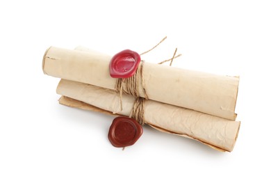 Photo of Old rolled paper scrolls isolated on white
