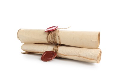 Photo of Old rolled paper scrolls isolated on white