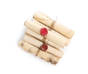 Photo of Old rolled paper scrolls isolated on white