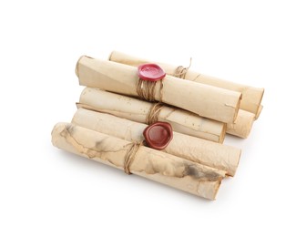 Photo of Old rolled paper scrolls isolated on white