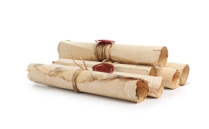 Photo of Old rolled paper scrolls isolated on white