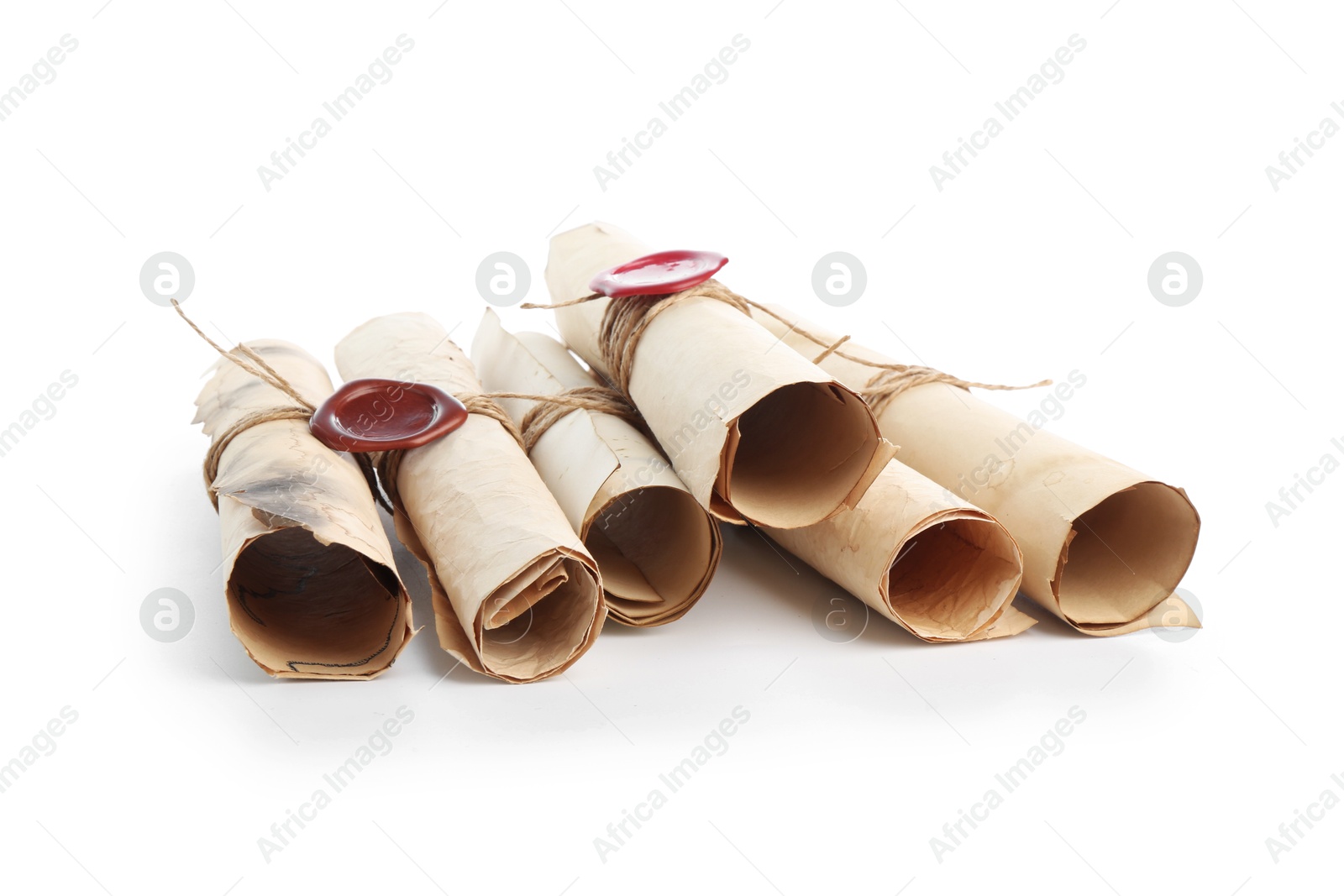 Old rolled paper scrolls isolated on white Photo of Old rolled paper scrolls isolated on white