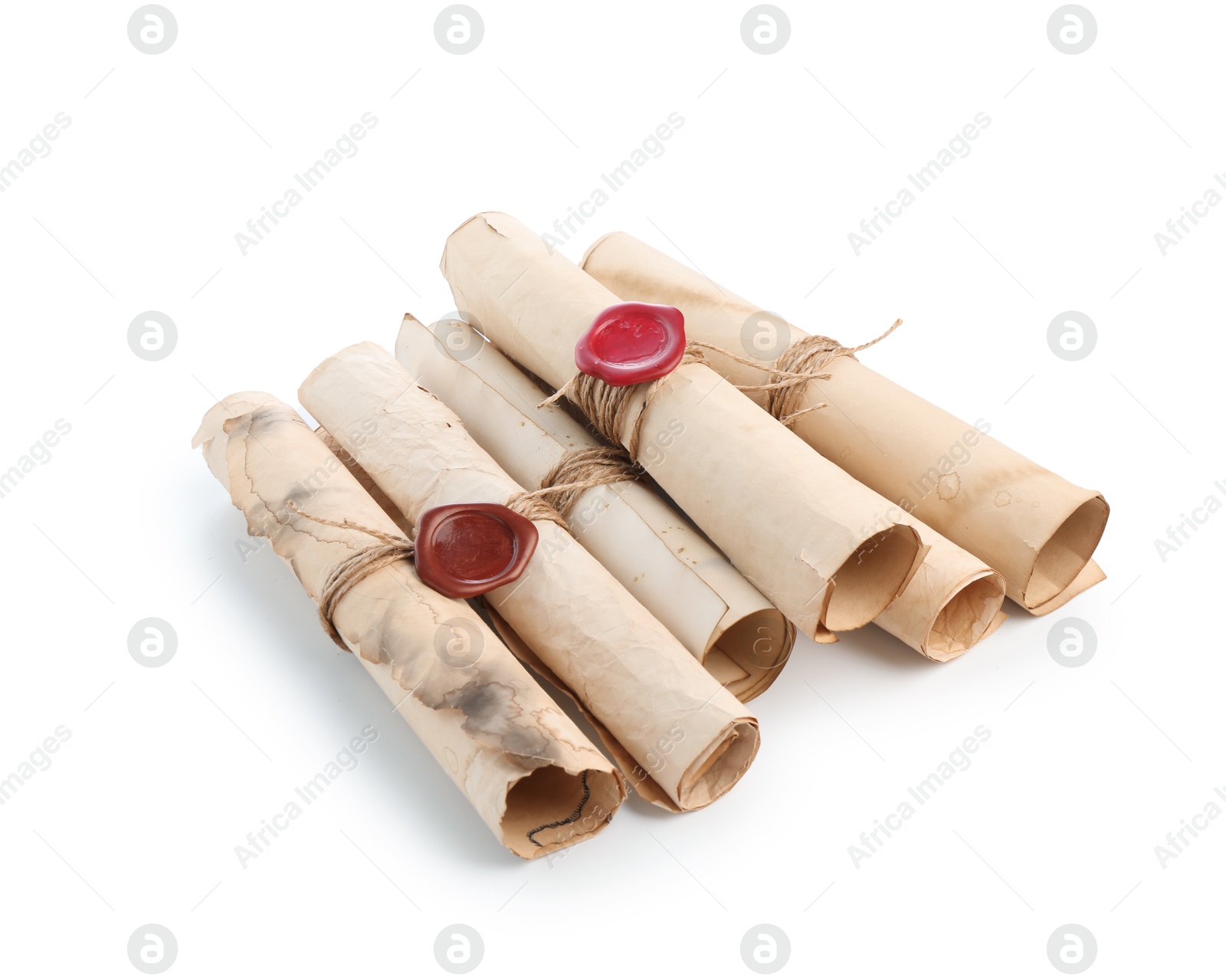 Old rolled paper scrolls isolated on white Photo of Old rolled paper scrolls isolated on white