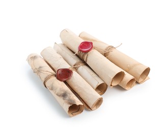 Photo of Old rolled paper scrolls isolated on white