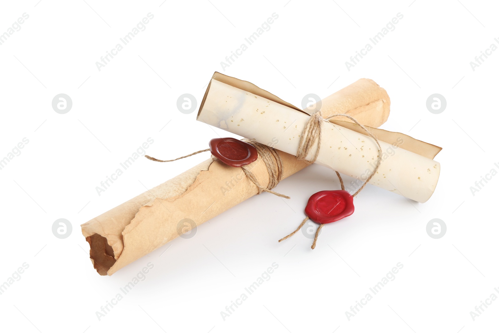 Old rolled paper scrolls isolated on white Photo of Old rolled paper scrolls isolated on white