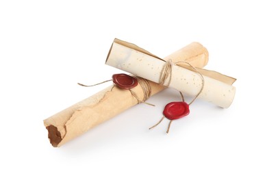 Photo of Old rolled paper scrolls isolated on white