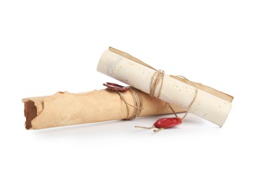 Photo of Old rolled paper scrolls isolated on white
