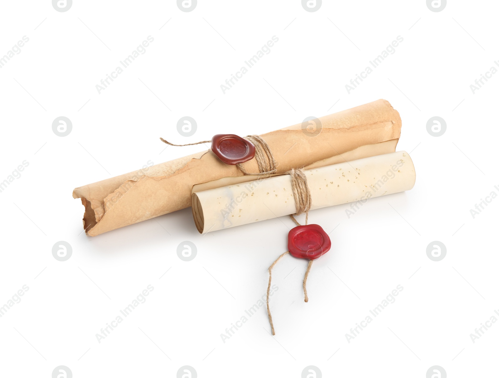 Old rolled paper scrolls isolated on white Photo of Old rolled paper scrolls isolated on white