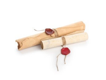 Photo of Old rolled paper scrolls isolated on white