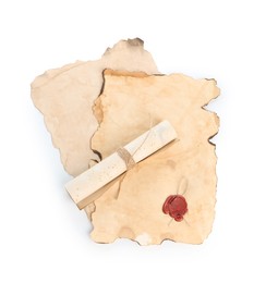 Photo of Sheets and scroll of old paper isolated on white, top view