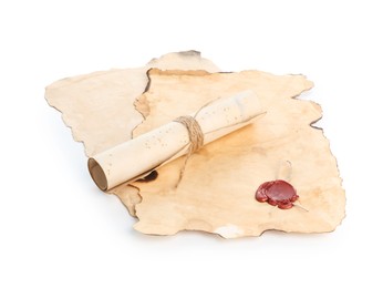 Photo of Sheets and scroll of old paper isolated on white