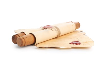 Photo of Sheets and scroll of old paper isolated on white