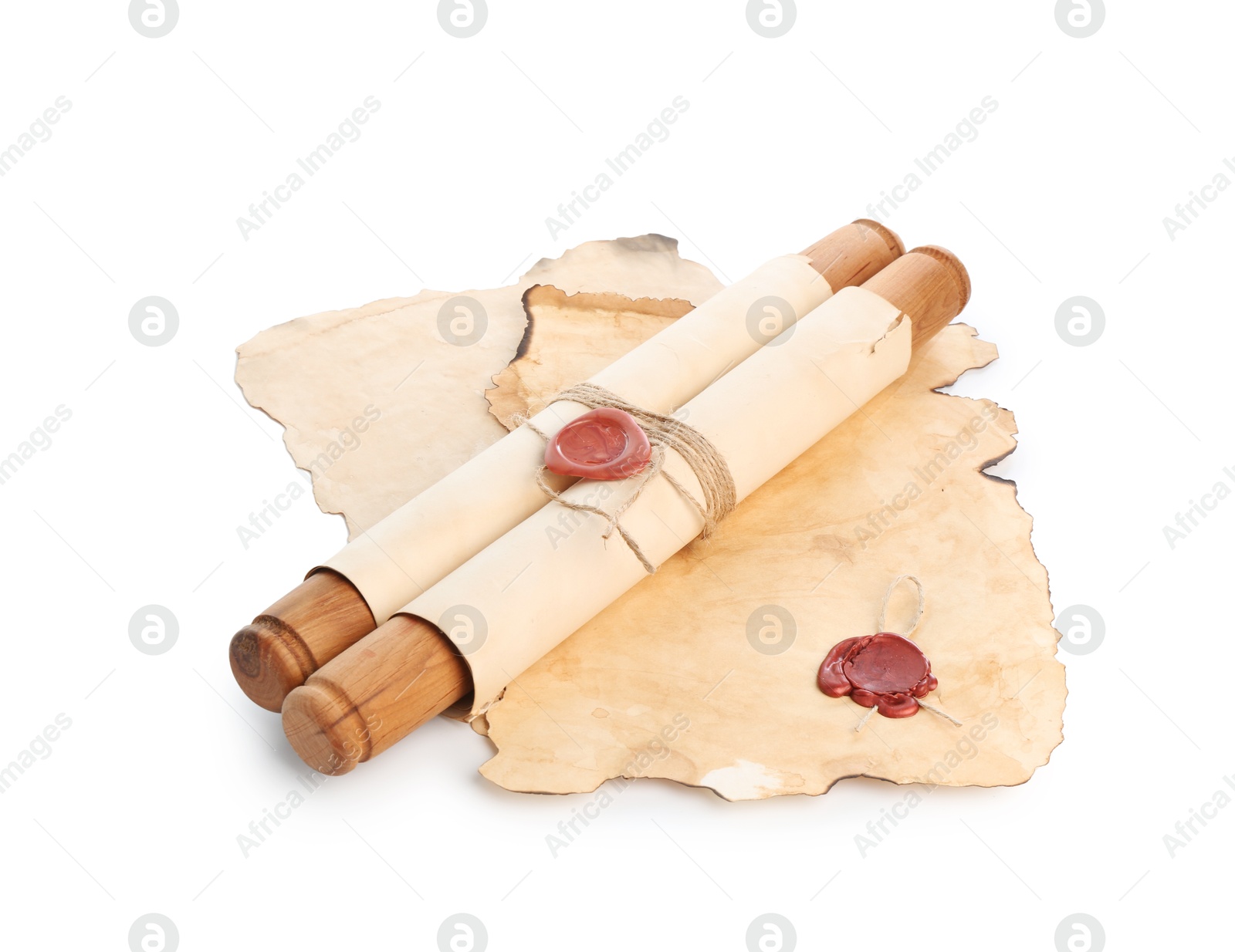 Photo of Sheets and scroll of old paper isolated on white