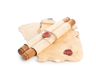 Photo of Sheets and scroll of old paper isolated on white