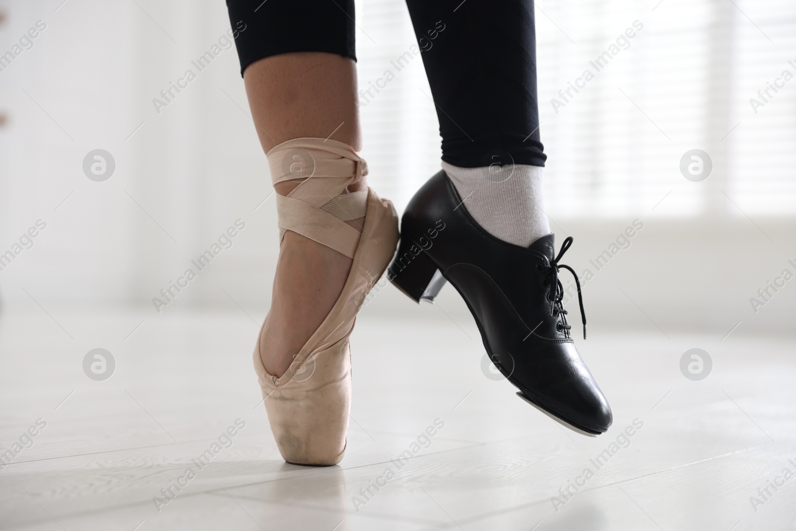 Teenage girl in tap and pointe shoe indoors, closeup Photo of Teenage girl in tap and pointe shoe indoors, closeup