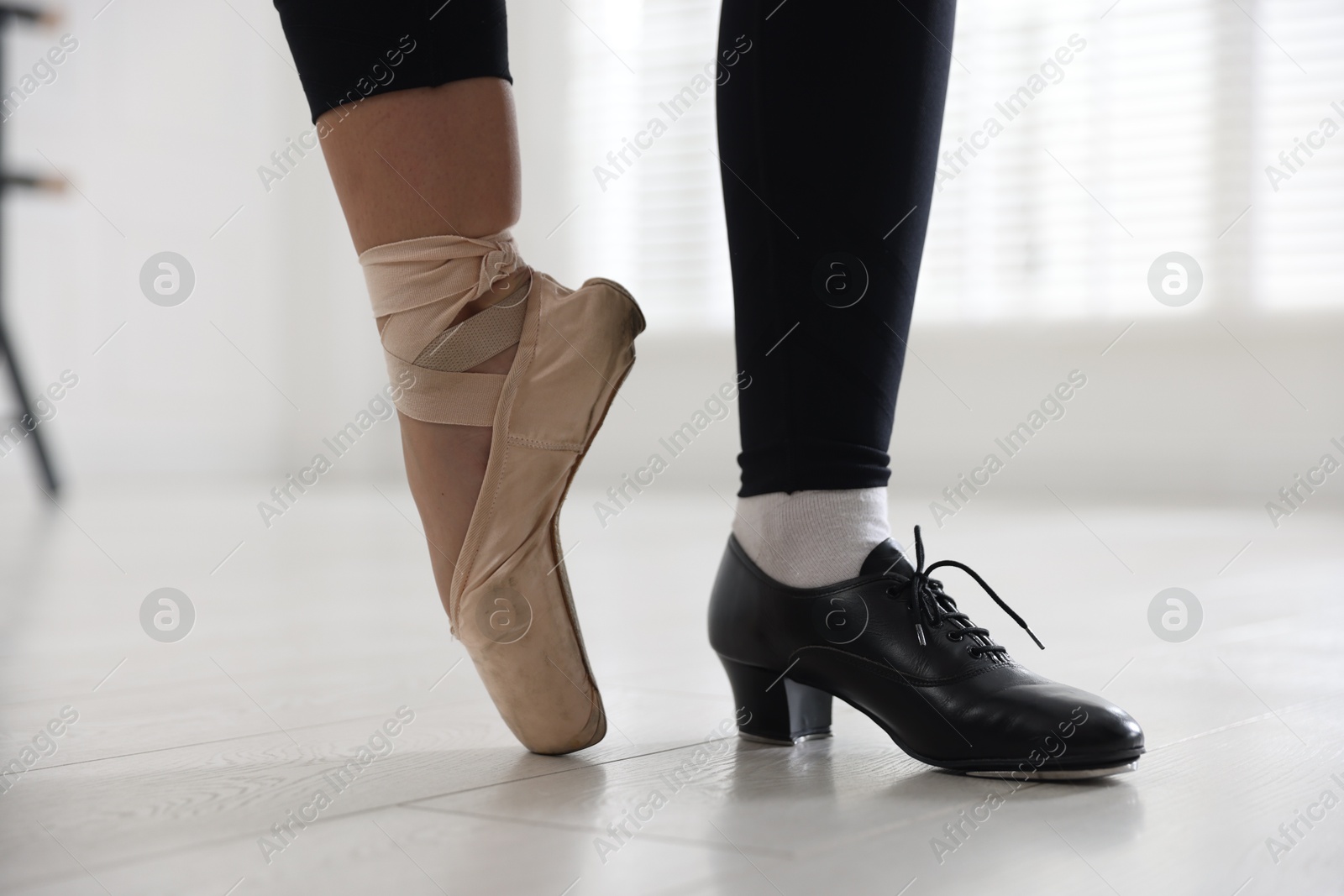 Teenage girl in tap and pointe shoe indoors, closeup Photo of Teenage girl in tap and pointe shoe indoors, closeup