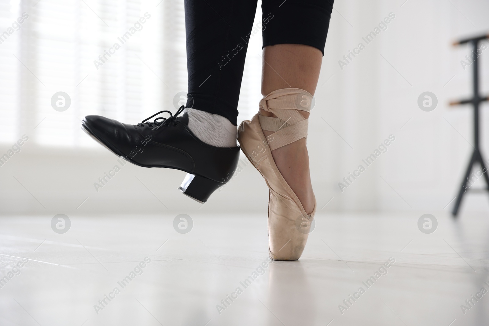 Teenage girl in tap and pointe shoe indoors, closeup Photo of Teenage girl in tap and pointe shoe indoors, closeup