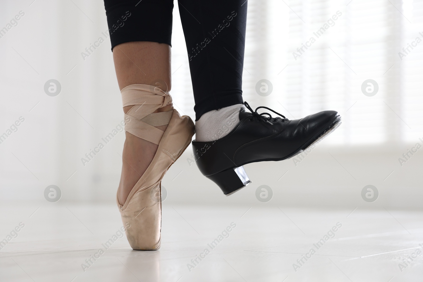 Teenage girl in tap and pointe shoe indoors, closeup Photo of Teenage girl in tap and pointe shoe indoors, closeup
