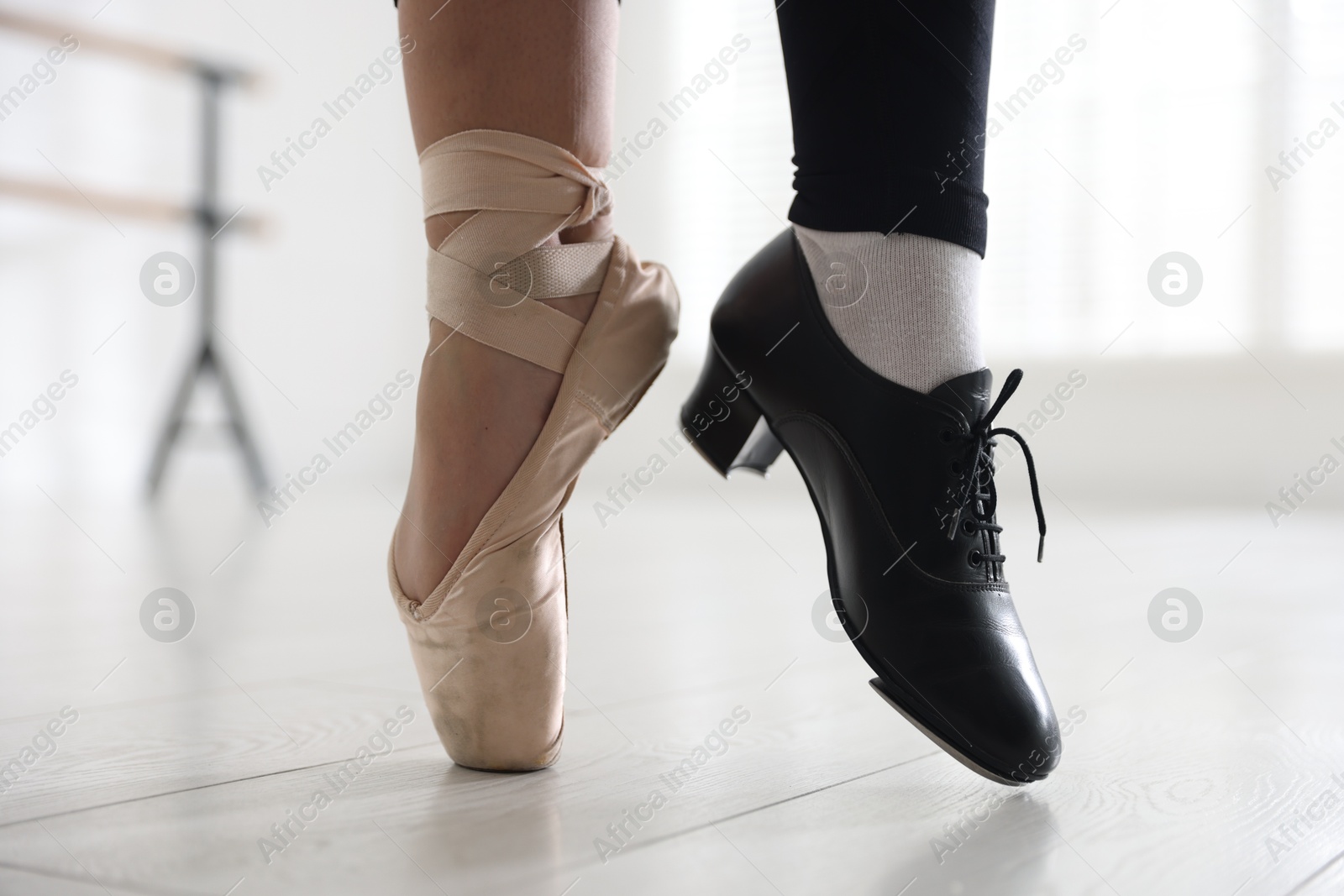 Teenage girl in tap and pointe shoe indoors, closeup Photo of Teenage girl in tap and pointe shoe indoors, closeup