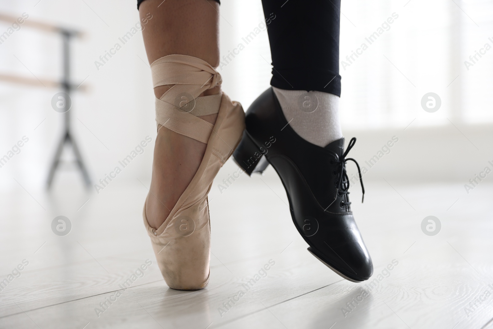 Teenage girl in tap and pointe shoe indoors, closeup Photo of Teenage girl in tap and pointe shoe indoors, closeup