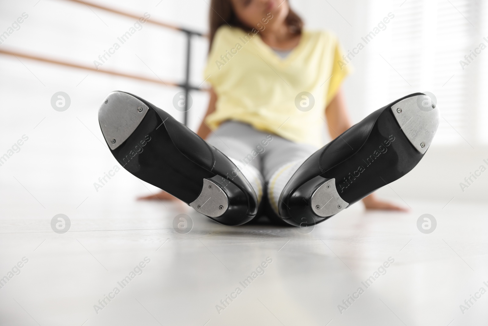 Teenage girl in tap shoes indoors, closeup Photo of Teenage girl in tap shoes indoors, closeup