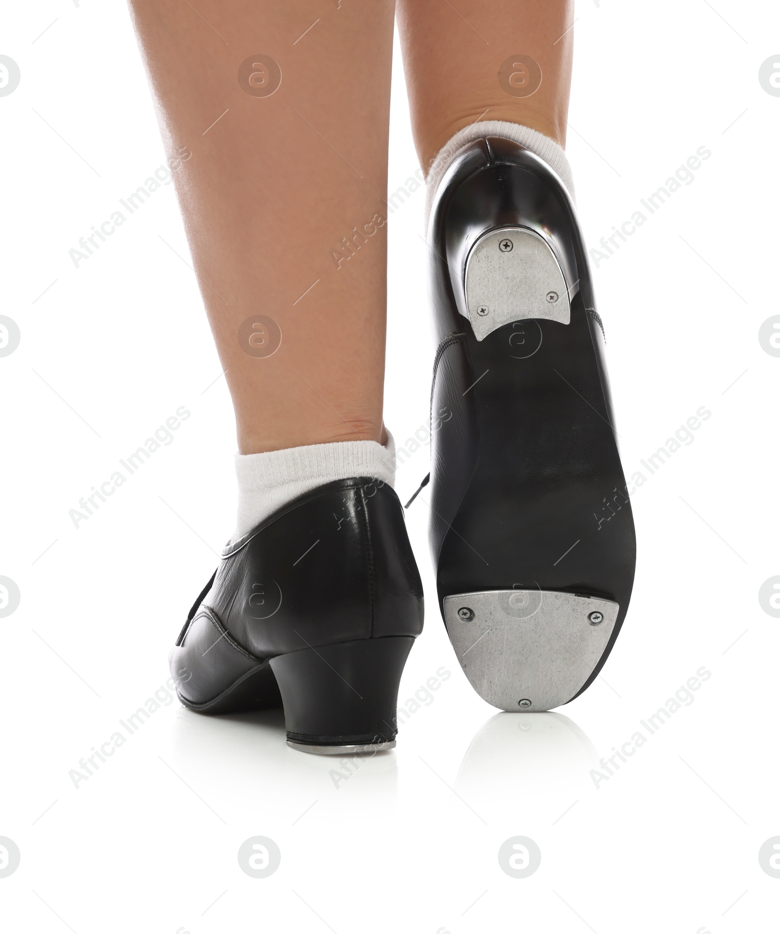 Teenage girl in tap shoes on white background, closeup Photo of Teenage girl in tap shoes on white background, closeup