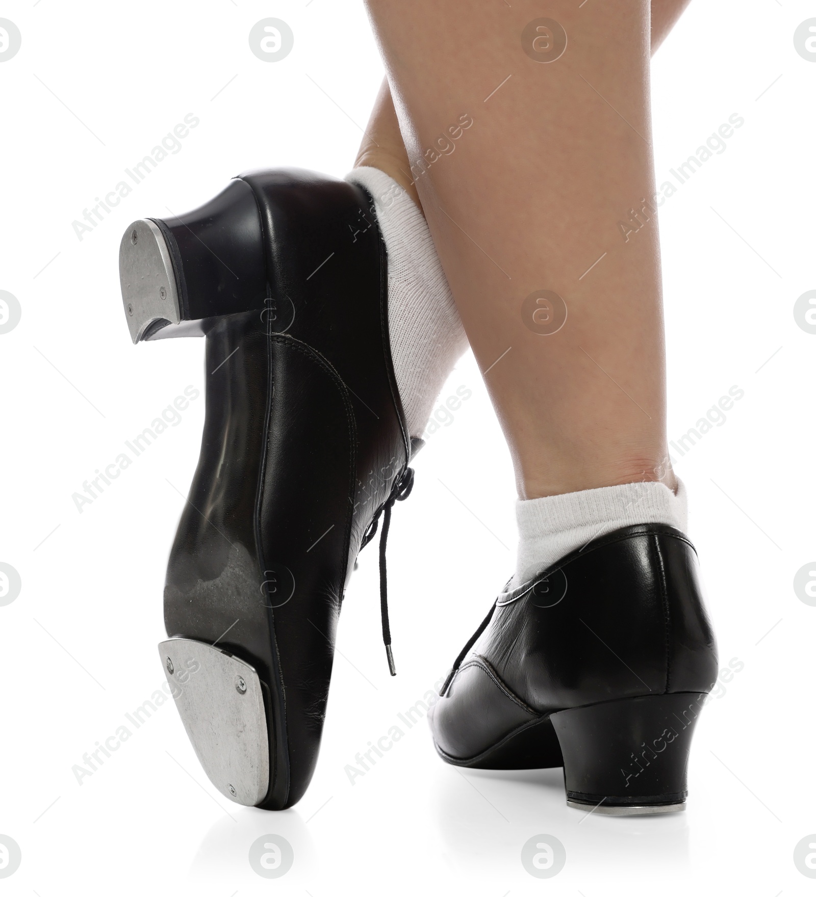 Teenage girl in tap shoes on white background, closeup Photo of Teenage girl in tap shoes on white background, closeup