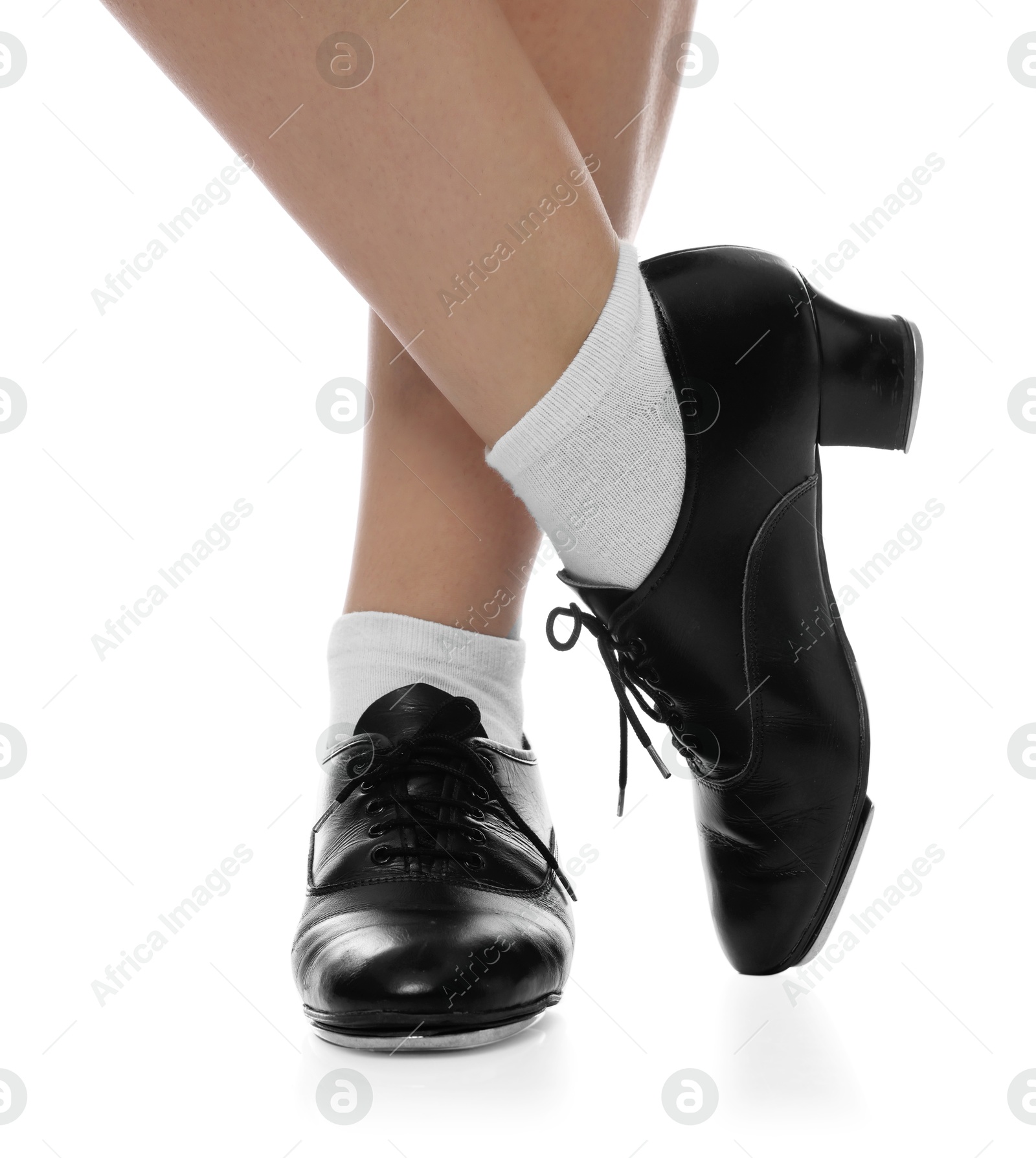 Teenage girl in tap shoes on white background, closeup Photo of Teenage girl in tap shoes on white background, closeup