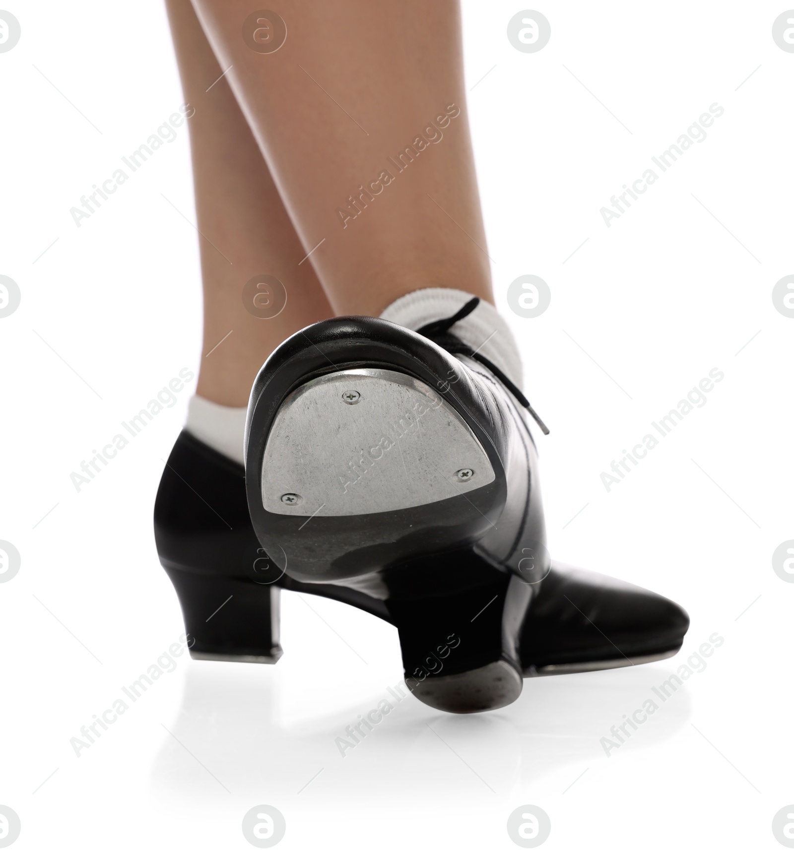 Teenage girl in tap shoes on white background, closeup Photo of Teenage girl in tap shoes on white background, closeup