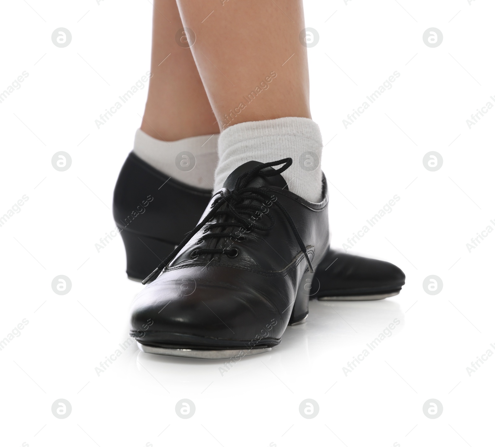 Teenage girl in tap shoes on white background, closeup Photo of Teenage girl in tap shoes on white background, closeup