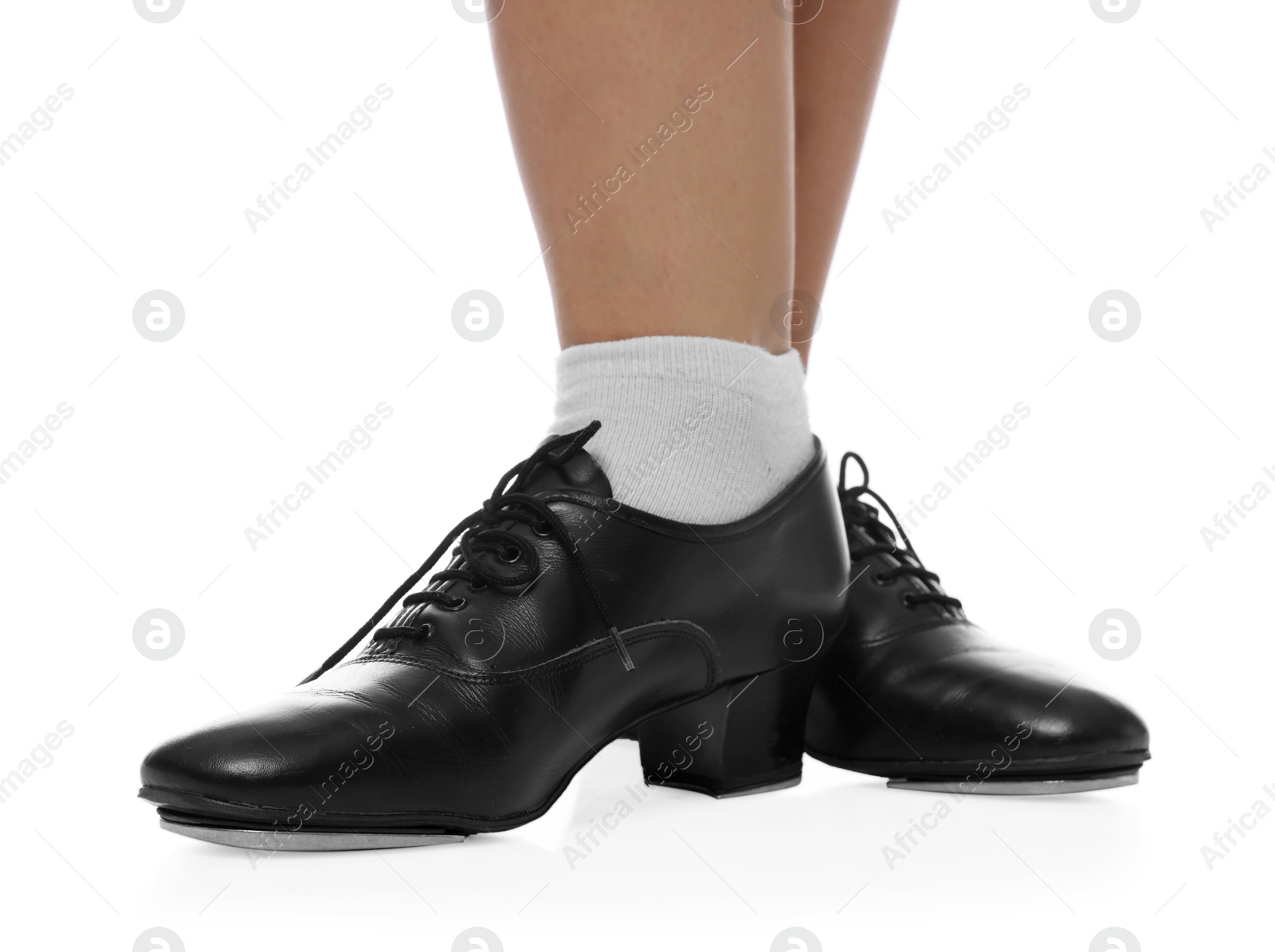 Teenage girl in tap shoes on white background, closeup Photo of Teenage girl in tap shoes on white background, closeup