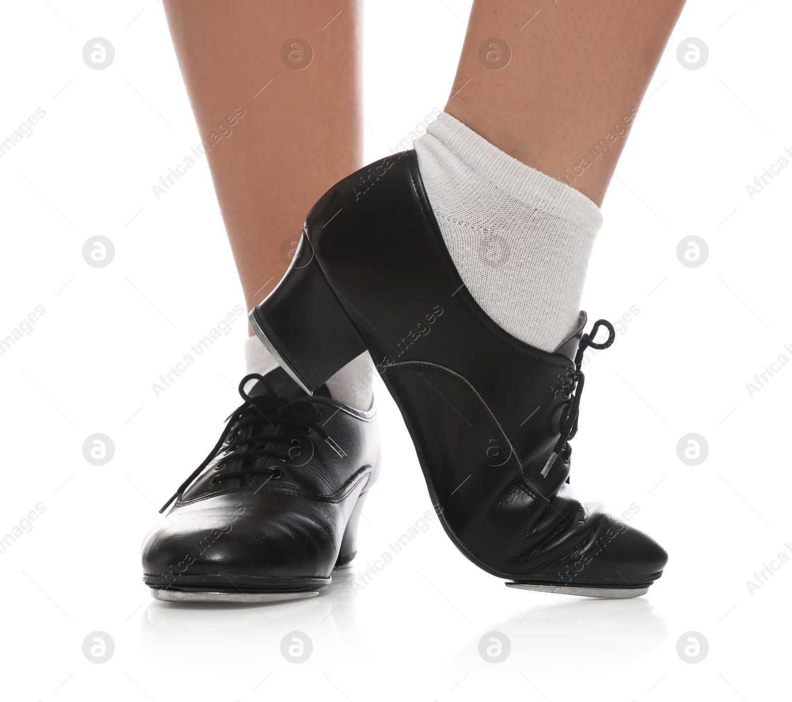 Teenage girl in tap shoes on white background, closeup Photo of Teenage girl in tap shoes on white background, closeup