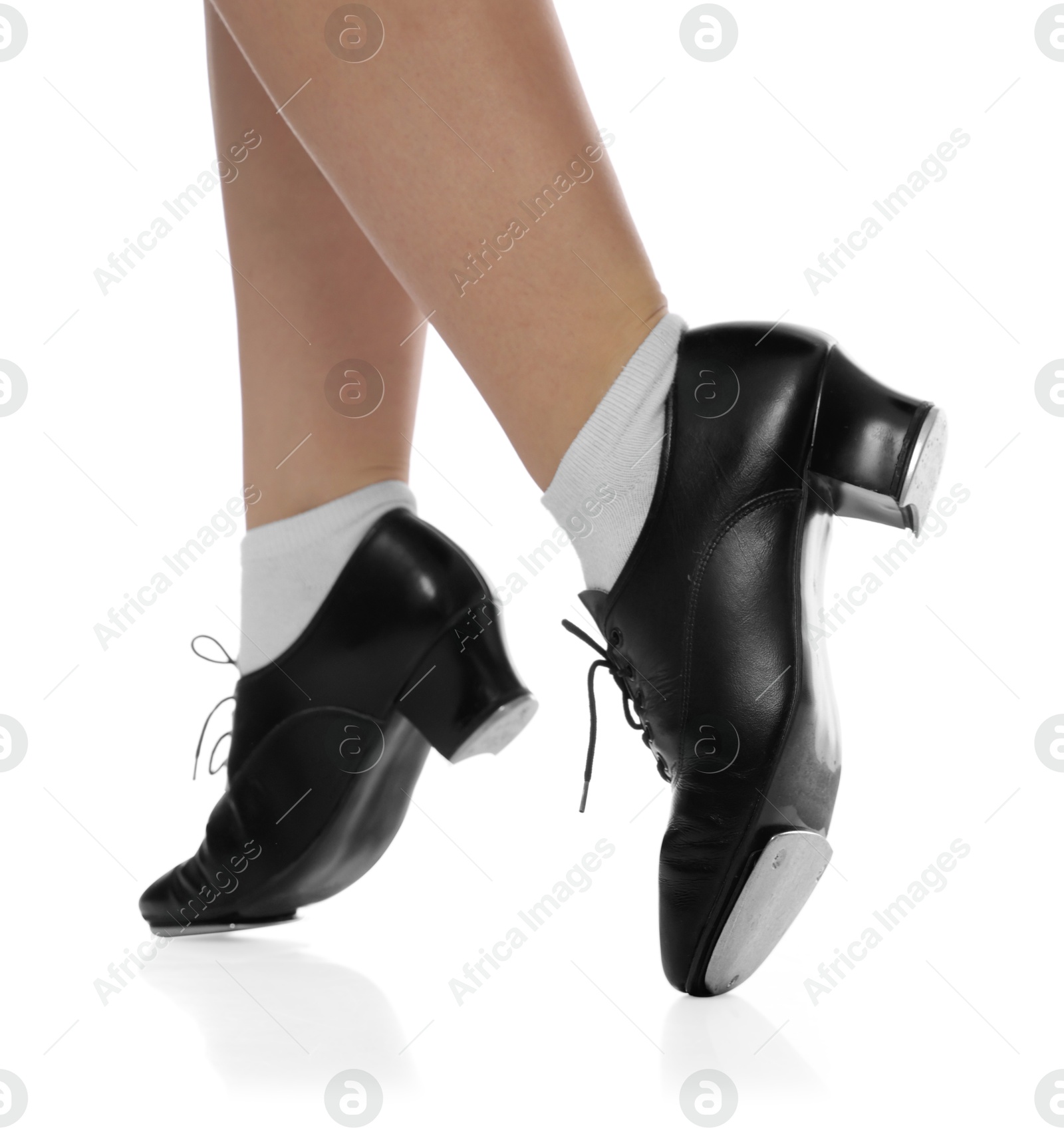 Teenage girl in tap shoes on white background, closeup Photo of Teenage girl in tap shoes on white background, closeup