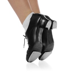 Photo of Teenage girl in tap shoes on white background, closeup