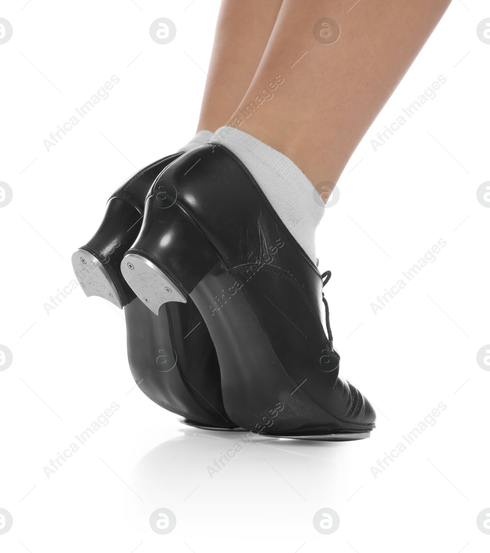 Teenage girl in tap shoes on white background, closeup Photo of Teenage girl in tap shoes on white background, closeup