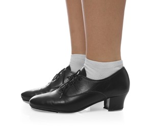 Photo of Teenage girl in tap shoes on white background, closeup