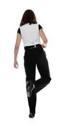 Photo of Teenage girl in tap shoes dancing on white background, back view