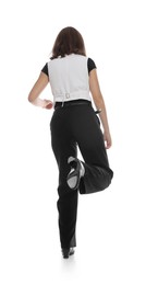 Photo of Teenage girl in tap shoes dancing on white background, back view