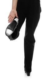 Photo of Teenage girl in tap shoes on white background, closeup