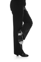 Photo of Teenage girl in tap shoes on white background, closeup